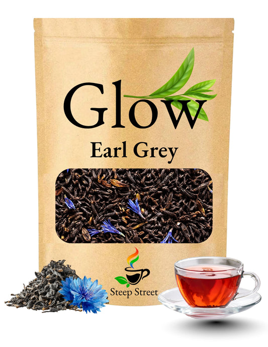 Tea package labeled 'Glow Earl Grey' with tea leaves and a cup of tea on a white background